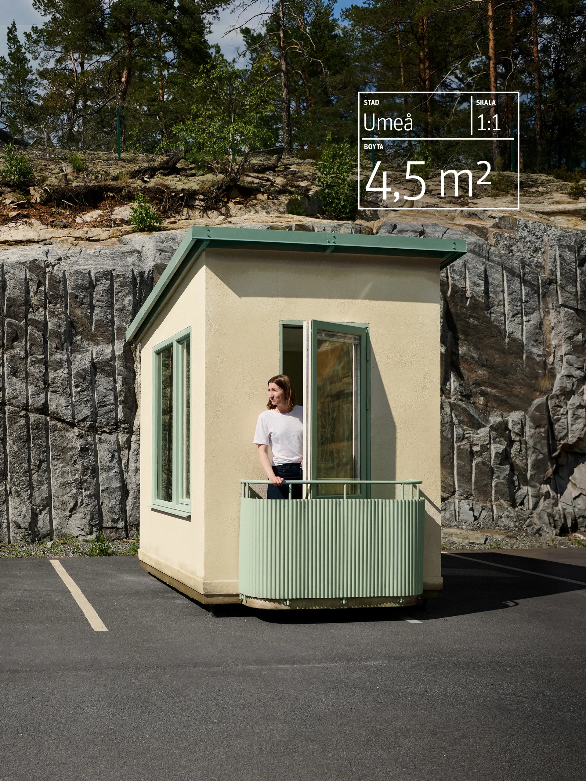 A woman stands on the balcony of a tiny house with light green trim against a rocky hillside. The text reads "Umeå, Scale 1:1, 4,5m2"